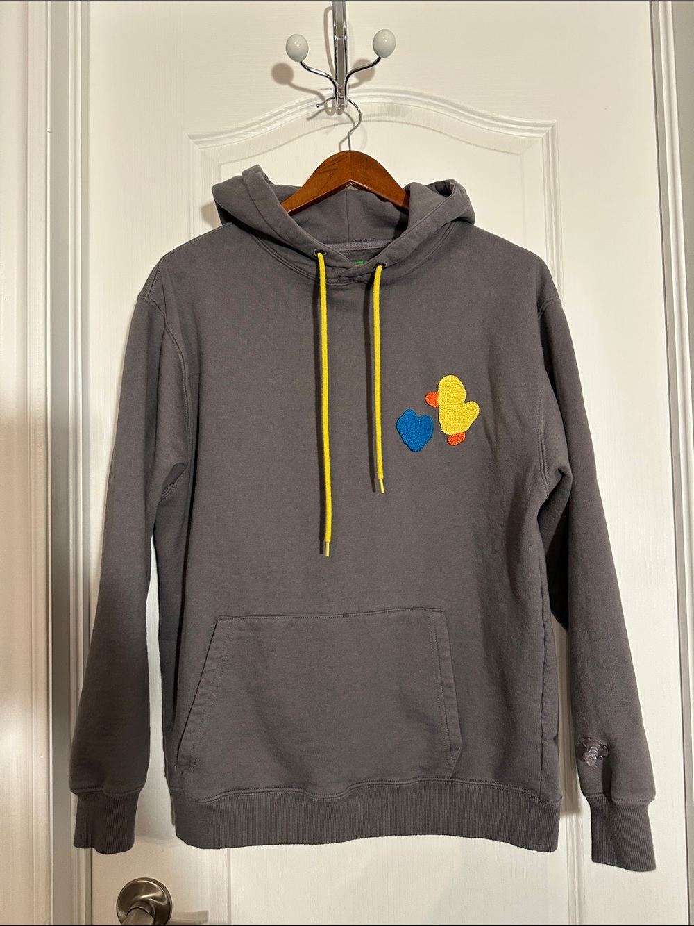 Melting Sadness duck embroidered grey hoodie.